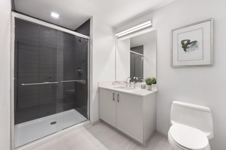 Bathroom with walk-in shower.